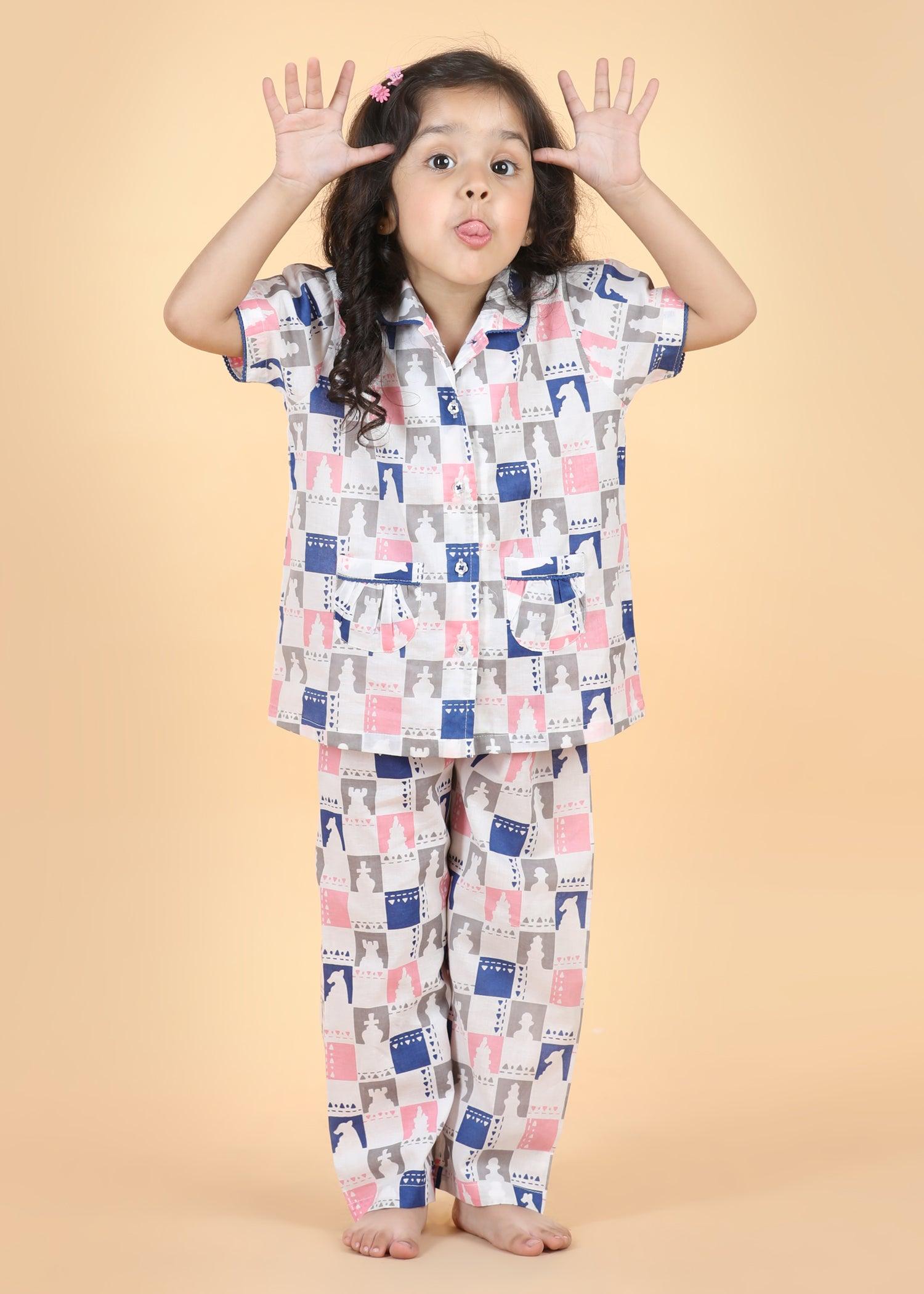 Chessboard Pink Half Sleeves Cotton Girl's Nightsuit (1-12 Yrs) Ratan Texprocess Pvt. Ltd